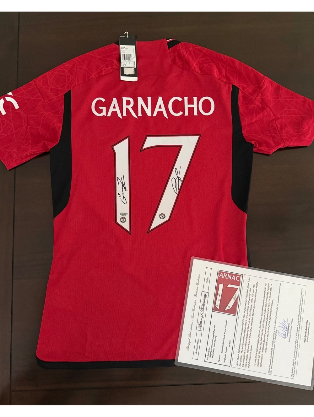 Man United jersey hand signed by Bruno Fernandes and Ale Garnacho